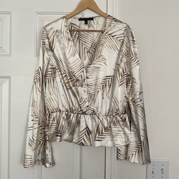 White House Black Market Tops - White House Black Market silky peplum blouse.